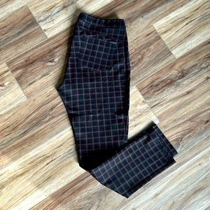 Anthropologie Sanctuary Leggings in brown/black checker print.